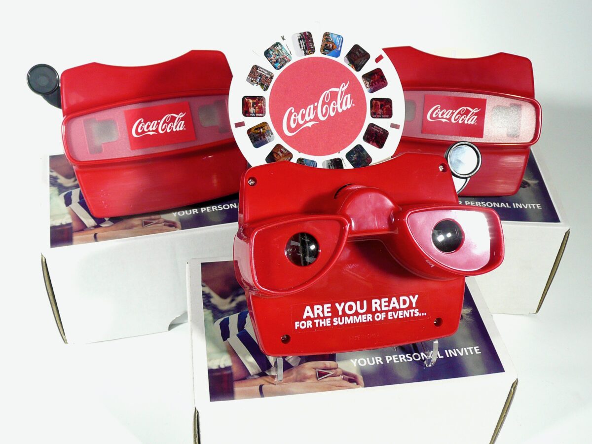 Communicatie events via Viewmaster klik fotoapparaat voor Coca Cola