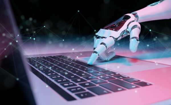Whats-next-hand van robot drukt op laptop -FX-Agency
